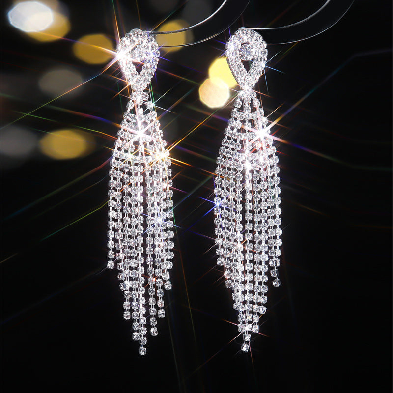 Classic long tassel earrings set with diamond stud earrings, a fashionable evening dress accessory