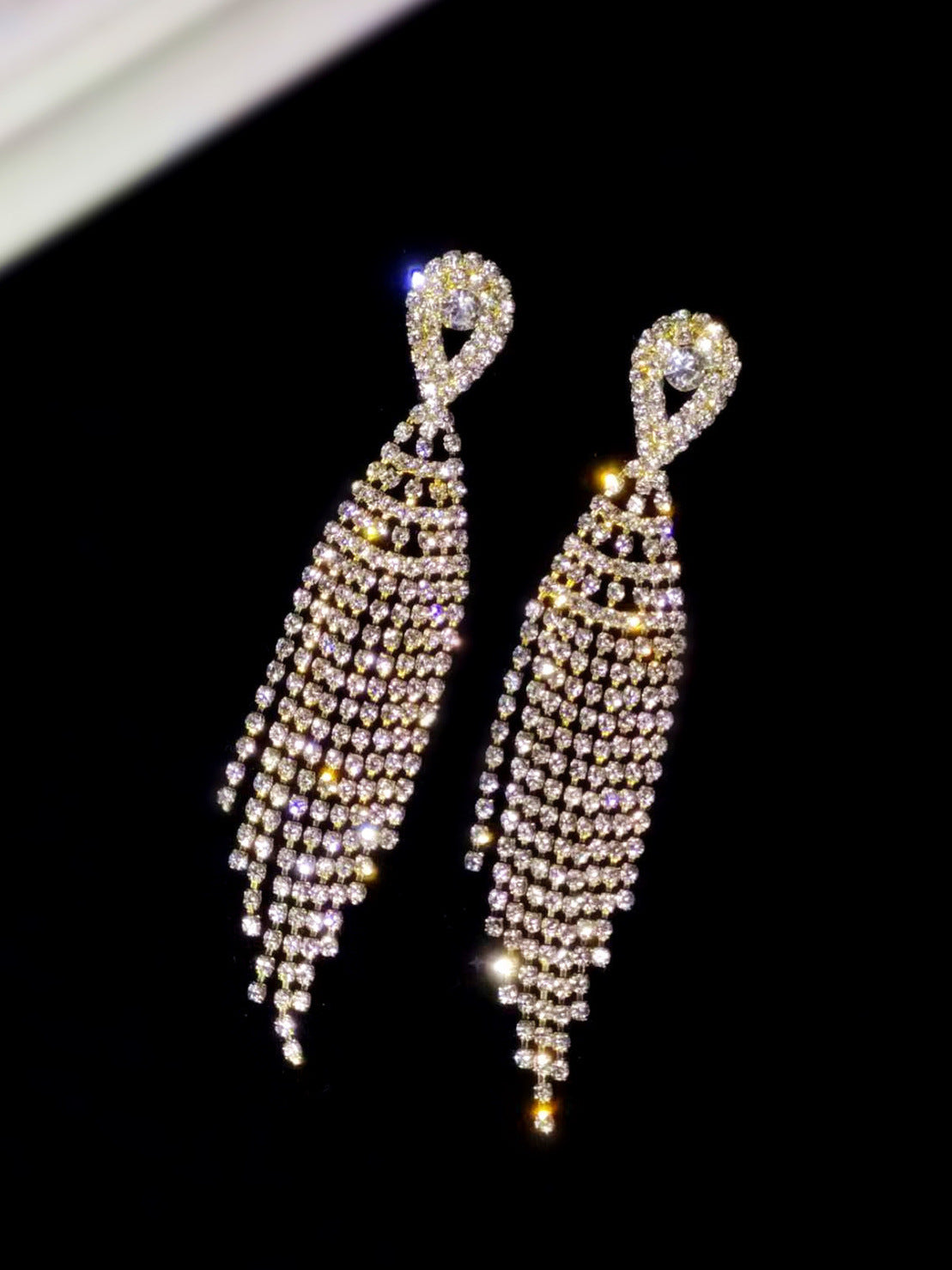 Classic long tassel earrings set with diamond stud earrings, a fashionable evening dress accessory