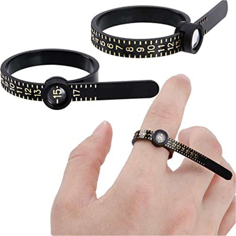 Measure the size of your finger with a magnifying glass ring and a ring tape measure