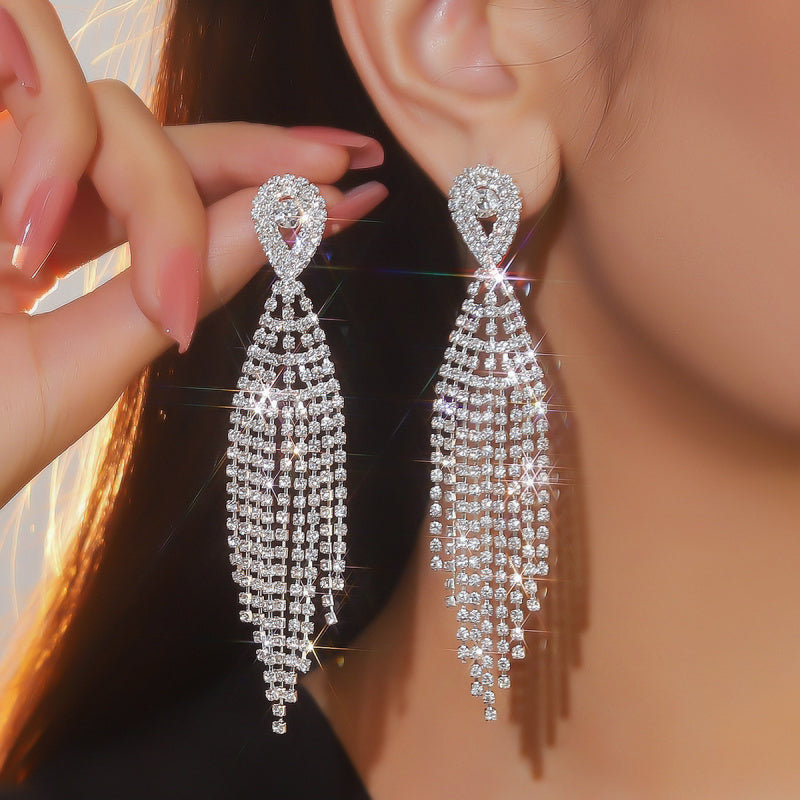 Classic long tassel earrings set with diamond stud earrings, a fashionable evening dress accessory